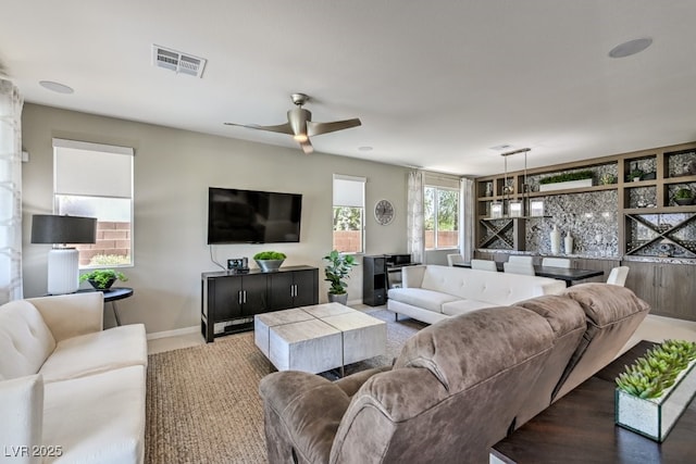 living room with ceiling fan