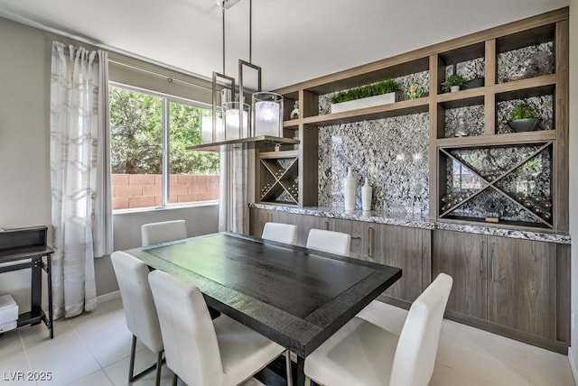 view of tiled dining space