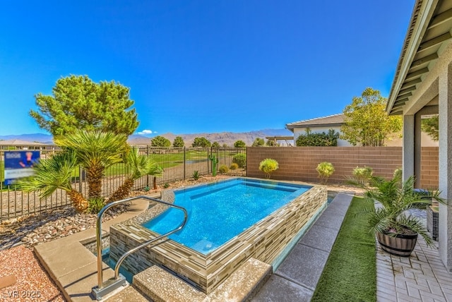 view of pool featuring a mountain view