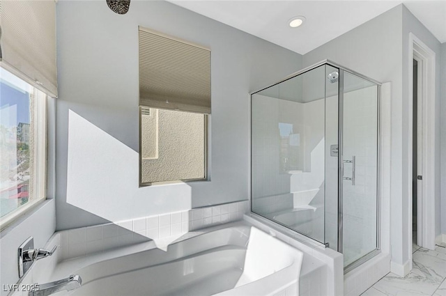 full bath featuring recessed lighting, marble finish floor, a shower stall, and a bath