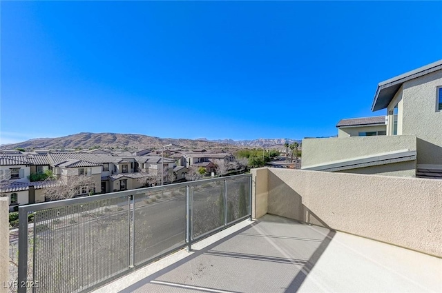 balcony featuring a mountain view