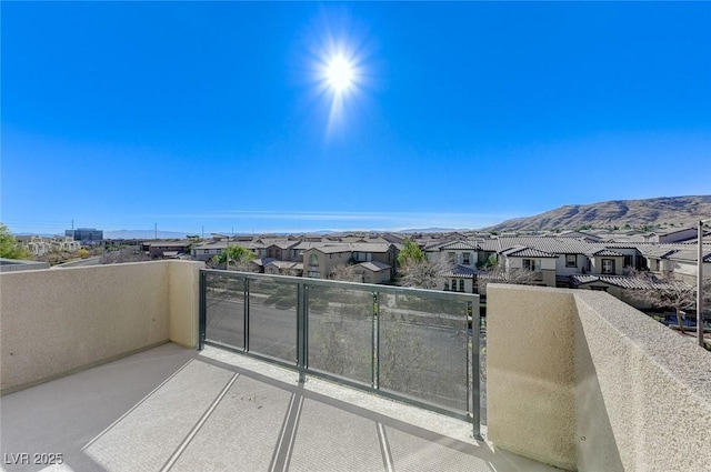 balcony featuring a mountain view