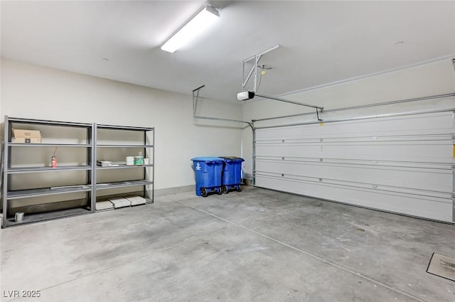 garage featuring a garage door opener