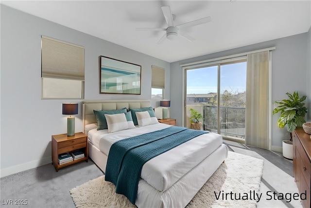 carpeted bedroom with ceiling fan and baseboards