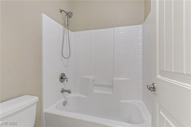 bathroom with toilet and shower / washtub combination