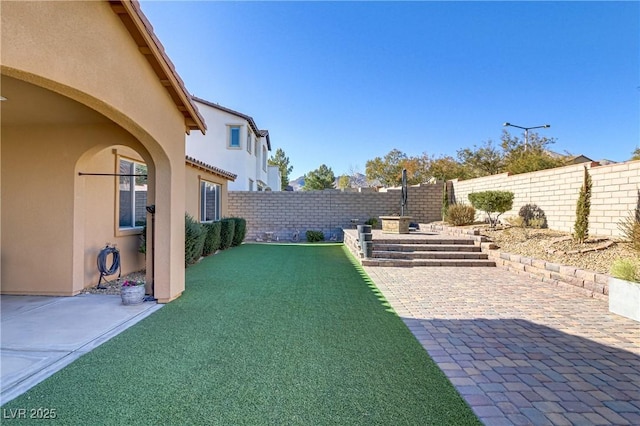 view of yard featuring a patio