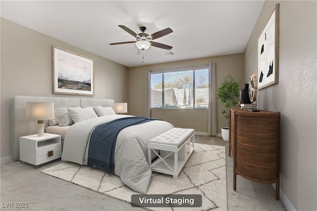 bedroom featuring ceiling fan and light carpet