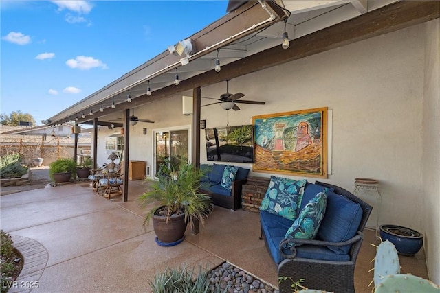 view of patio with ceiling fan