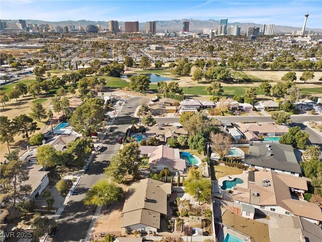 drone / aerial view featuring a mountain view