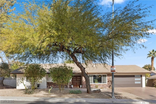 view of front of home featuring a garage