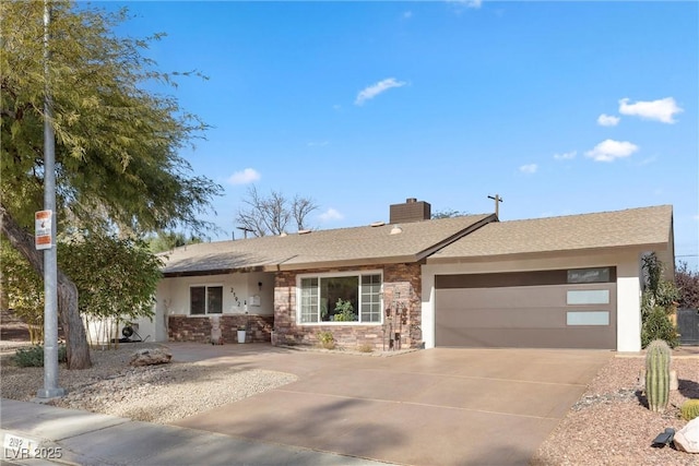 ranch-style home with a garage