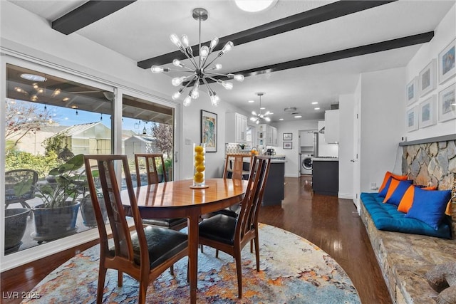 dining room featuring washer / dryer, an inviting chandelier, dark hardwood / wood-style floors, and beamed ceiling