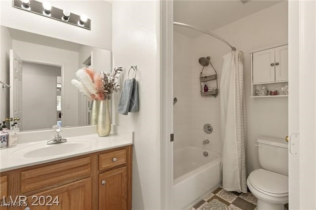 full bathroom featuring toilet, shower / bath combo, and vanity