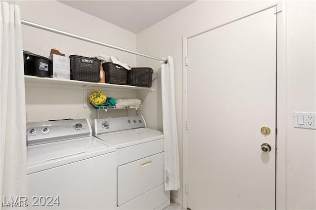 washroom featuring separate washer and dryer