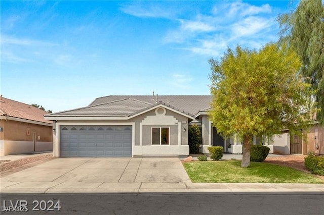 single story home featuring a garage