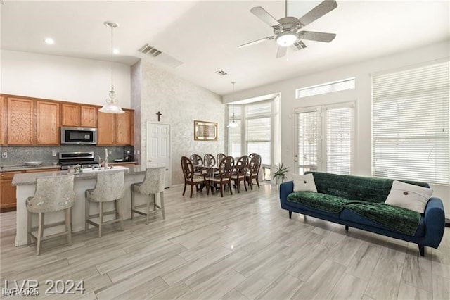 living room featuring ceiling fan