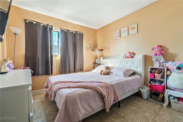 bedroom with a textured ceiling