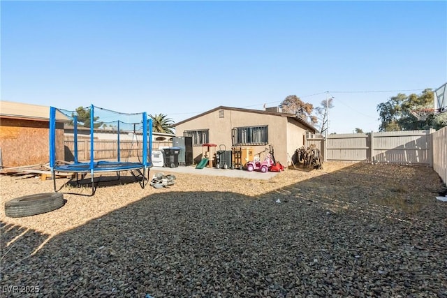 view of yard featuring a trampoline