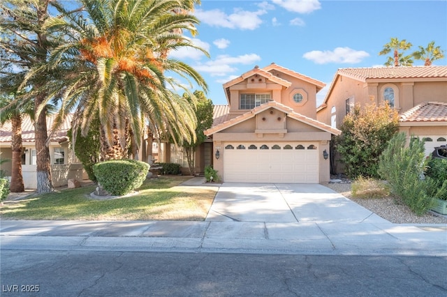 mediterranean / spanish-style home featuring a garage