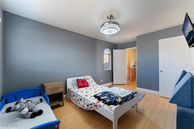 bedroom featuring hardwood / wood-style floors