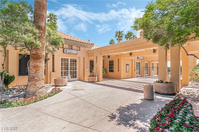 rear view of property with a patio area