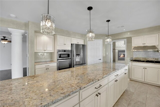 kitchen featuring ceiling fan, white cabinets, and appliances with stainless steel finishes