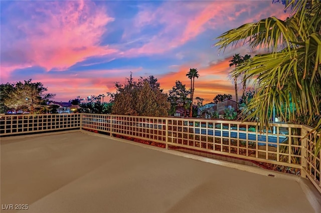 view of patio terrace at dusk