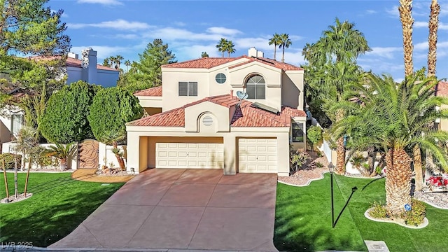 mediterranean / spanish home featuring a front yard and a garage