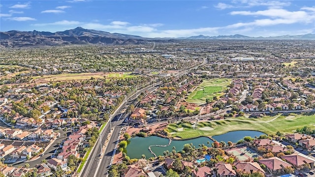 bird's eye view with a water and mountain view