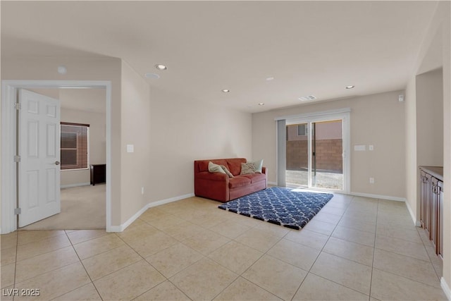 living room with light tile patterned floors