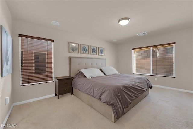 bedroom with light carpet