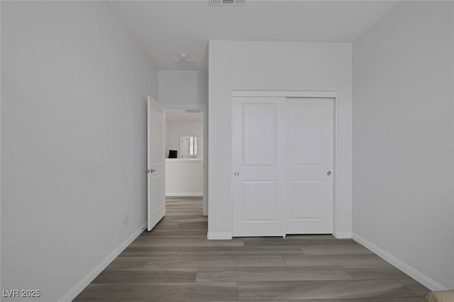 unfurnished bedroom featuring a closet