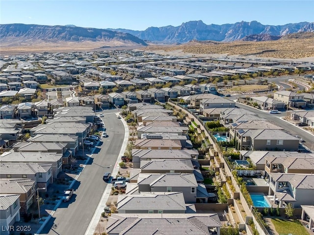 bird's eye view with a mountain view