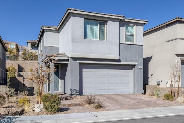 view of front of property featuring a garage