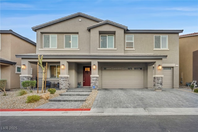 view of front of home with a garage