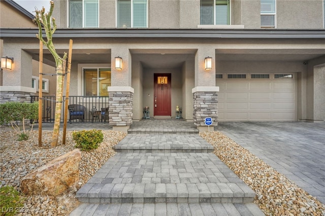 entrance to property featuring a garage