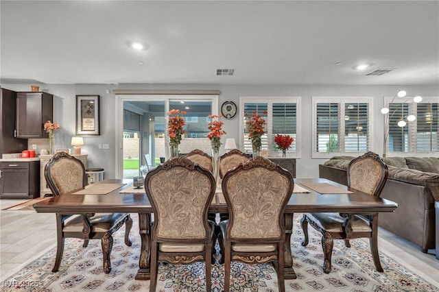 dining room featuring a healthy amount of sunlight