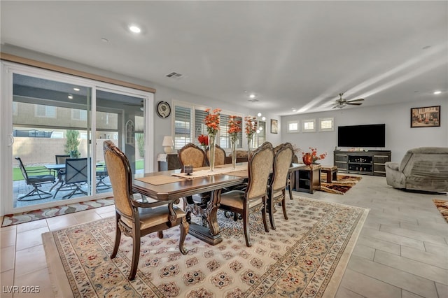 dining space featuring ceiling fan and a wealth of natural light