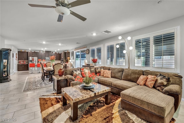 living room with ceiling fan