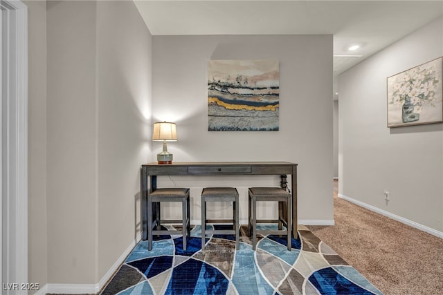 view of carpeted dining space