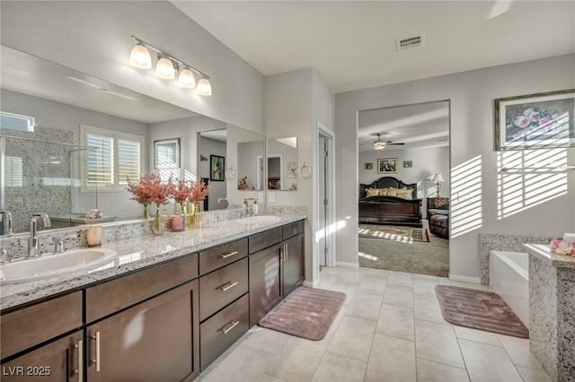 bathroom featuring ceiling fan, tile patterned floors, vanity, and separate shower and tub