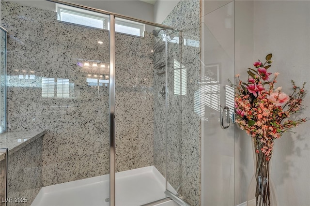 bathroom featuring an enclosed shower