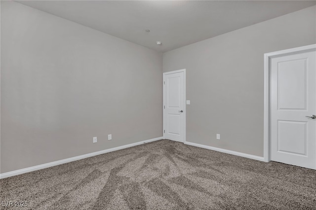 spare room featuring carpet floors