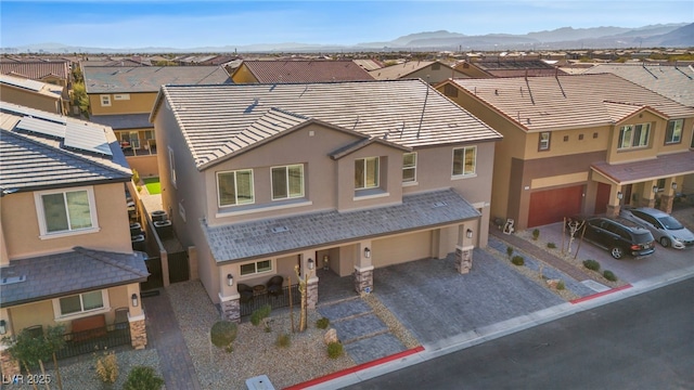 view of front of house featuring a mountain view