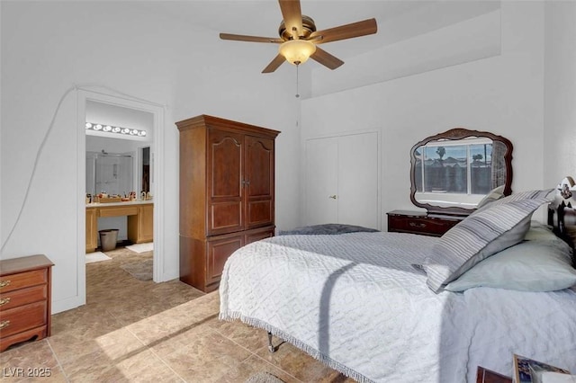 bedroom with ceiling fan and ensuite bathroom