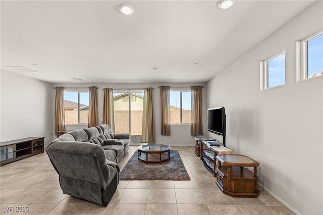 living room with light tile patterned floors