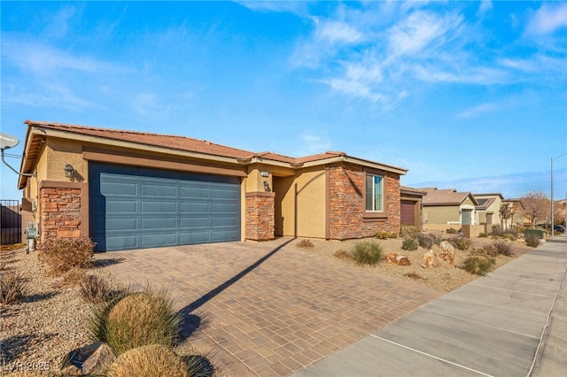 ranch-style home featuring a garage