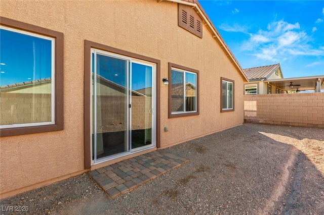 back of house with a patio