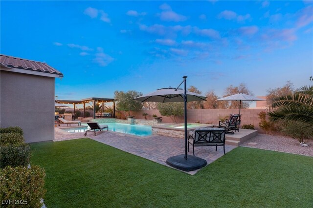 view of swimming pool with a patio area, a yard, and a pergola