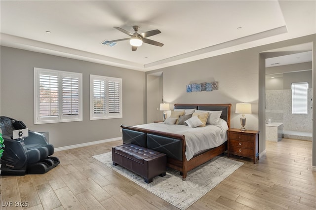 bedroom with light wood-type flooring and ceiling fan